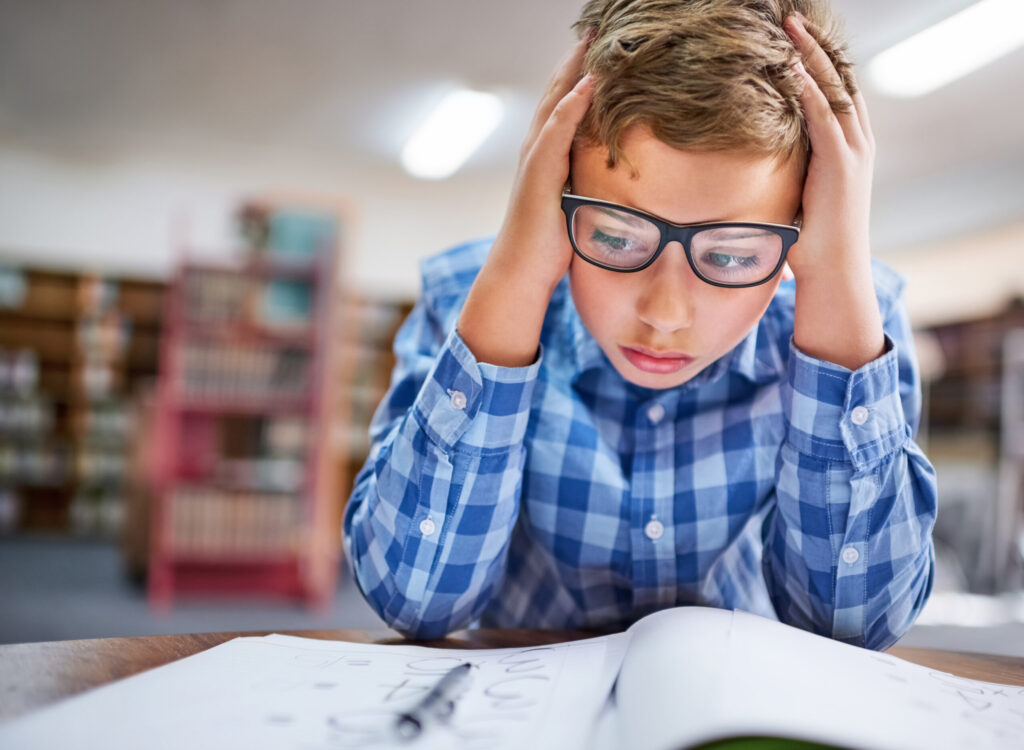 When Reading is hard, boy confused when trying to read.